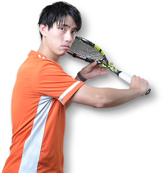 テニスをする男性